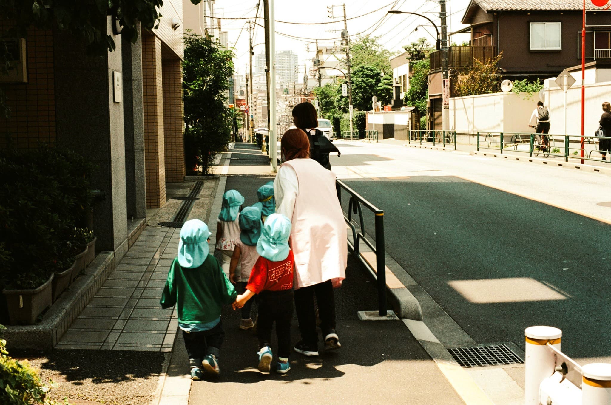 School children with teacher in uniform