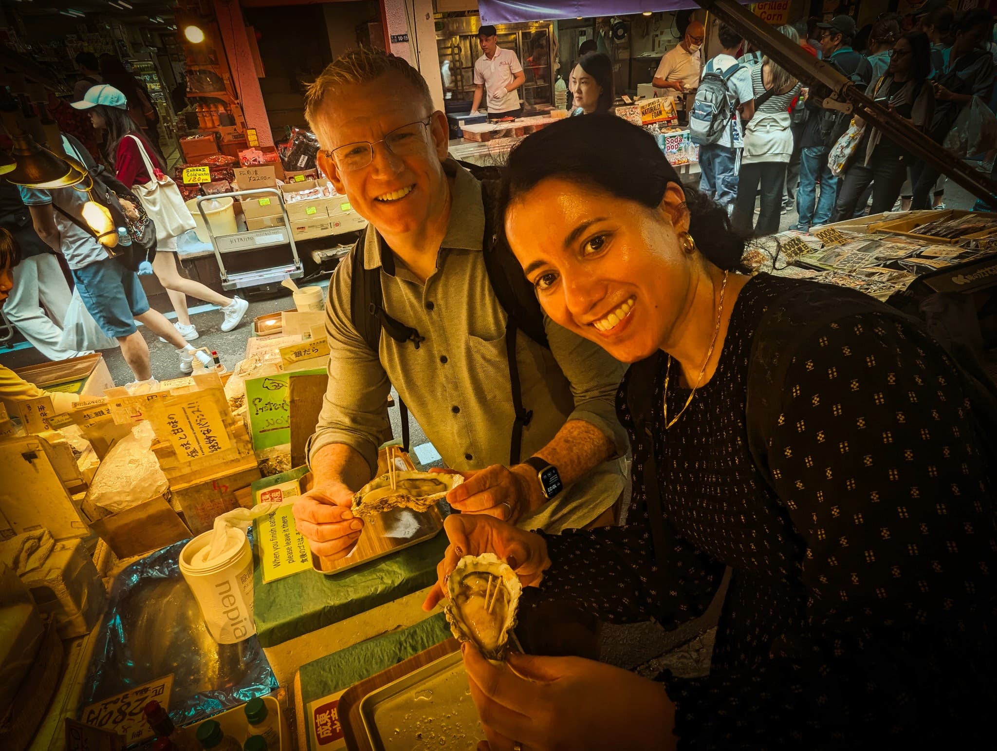 Hinomaru One Tokyo Essential Tour Guests Enjoying Seafood in Tsukiji Market